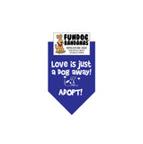 Royal Blue miniature dog bandana with Love is Just a Dog Away Adopt and a dog in white ink.