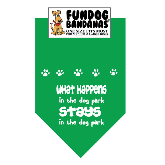 Kelly Green one size fits most dog bandana with What Happens in the dog park Stays in the dog park in white ink.