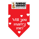 Red one size fits most dog bandana with Will You Marry Me? and hearts in white ink.