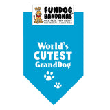 Turquoise one size fits most dog bandana with World's Cutest GrandDog and 2 paws in white ink.