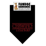 Black one size fits most dog bandana with Chewing Things in red ink.