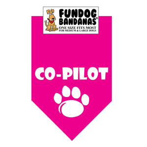 Hot Pink one size fits most dog bandana with Co-Pilot and a paw in white ink.