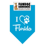Turquoise one size fits most dog bandana with I Heart Florida and a paw within a heart in white ink.