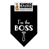 Black one size fits most dog bandana with I'm the Boss and a necktie in white ink.