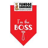 Red one size fits most dog bandana with I'm the Boss and a necktie in white ink.