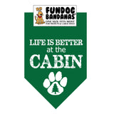 Forest Green one size fits most dog bandana with Life Is Better At The Cabin and a pine tree within a paw in white ink.