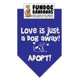 Royal Blue one size fits most dog bandana with Love is Just a Dog Away Adopt and a dog in white ink.