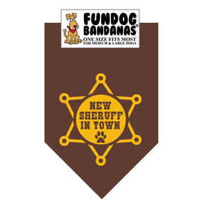 Brown one size fits most dog bandana with New Sheruff in Town and a sheriff's star in gold ink.