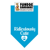 Turquoise one size fits most dog bandana with Ridiculously Cute and a paw within a heart in white ink.