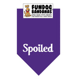 Purple one size fits most dog bandana with Spoiled in white ink.