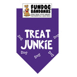 Purple one size fits most dog bandana with Treat Junkie and dog bones in white ink.