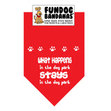 Red one size fits most dog bandana with What Happens in the dog park Stays in the dog park in white ink.